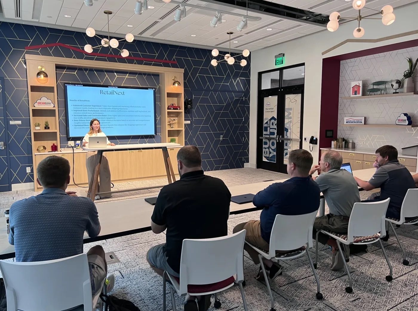 An AAIG member walking the group through a retail AI analysis