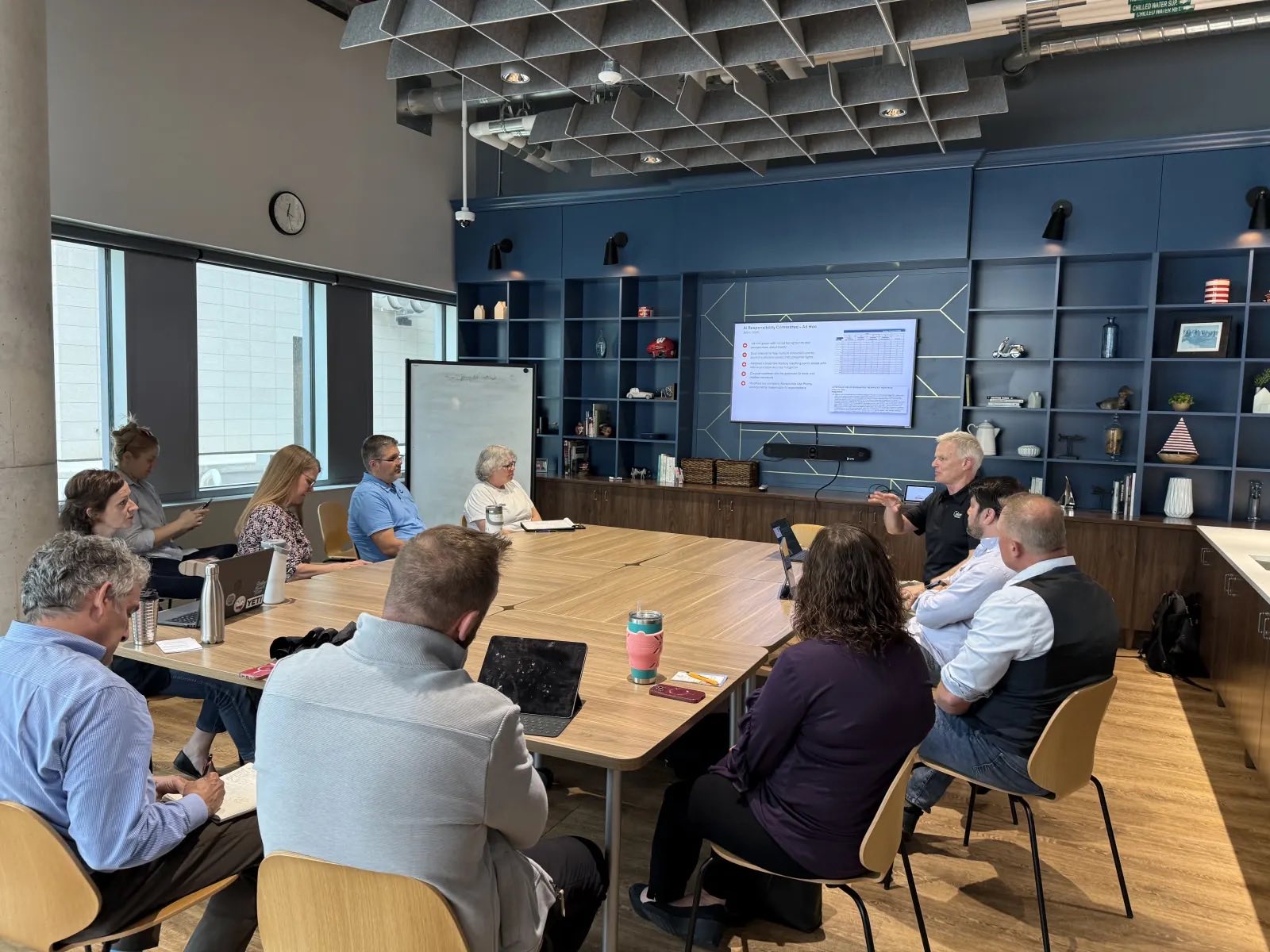 A small AAIG working session around one conference table